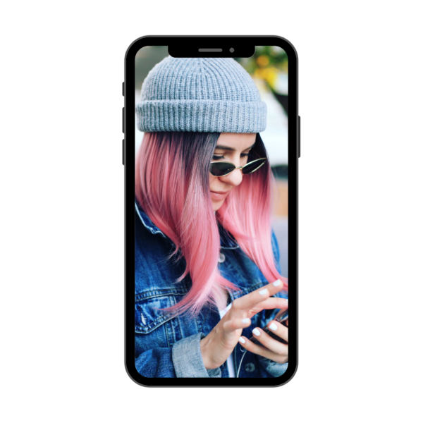 Trendy woman on a smart phone with pink hair